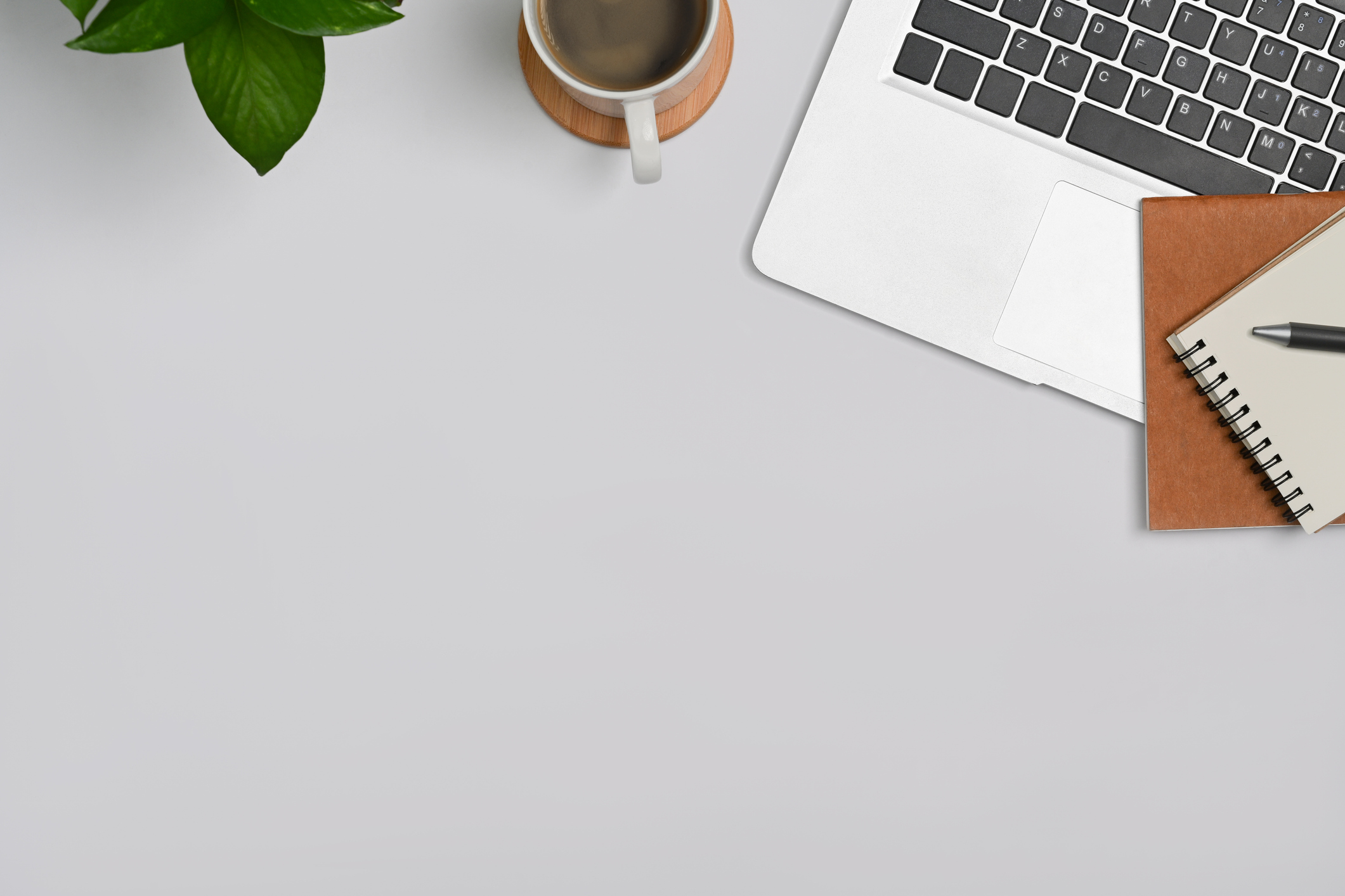 Desk with a laptop owned by a Payroll Administrator